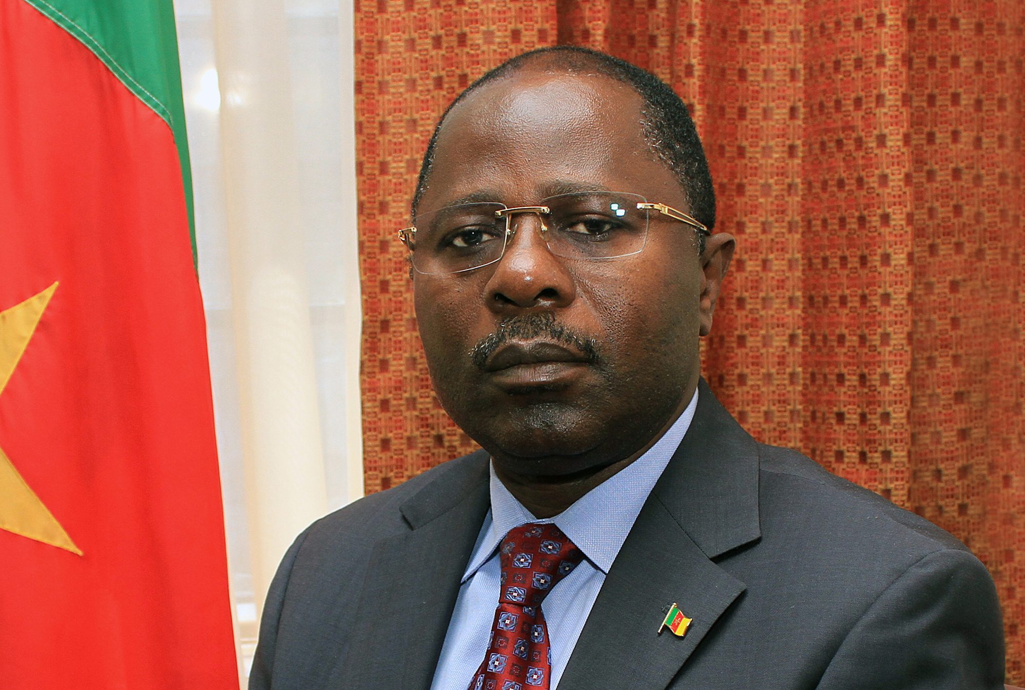 H. E. AZOH-MBI SOLOMON